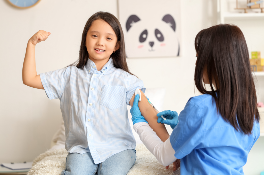 A young girl receiving a vaccine